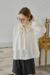 bowtie ribbon frill blouse
