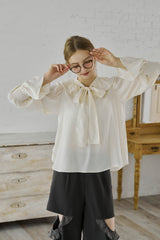 bowtie ribbon frill blouse
