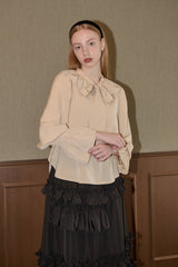 bowtie ribbon frill blouse