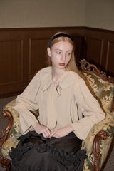 bowtie ribbon frill blouse