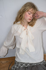 bowtie ribbon frill blouse