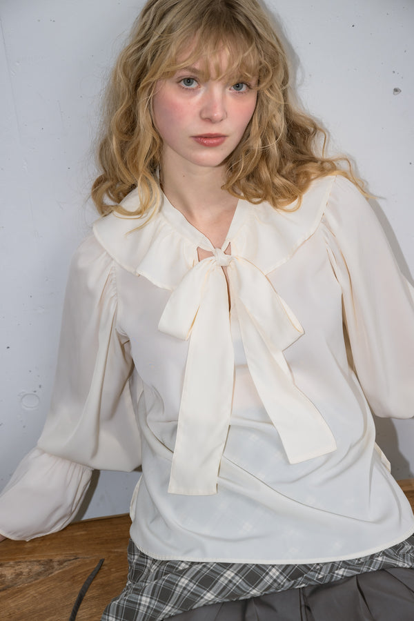 bowtie ribbon frill blouse